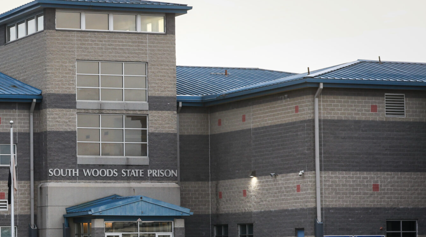 Exterior of South Woods State Prison in Bridgeton, New Jersey, showing the main building and entrance.