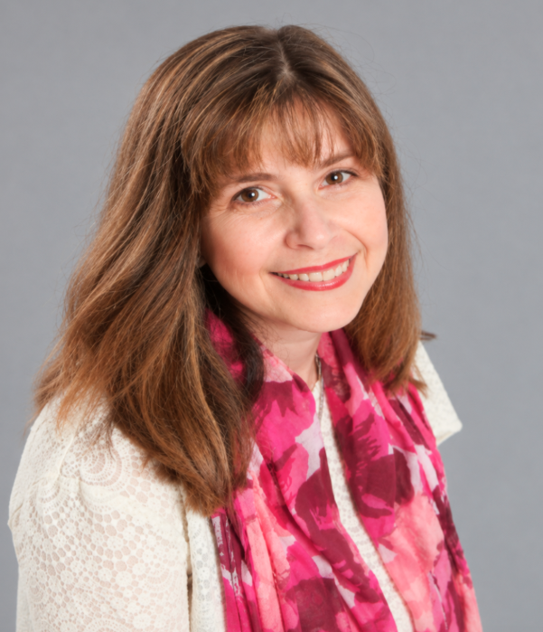 Professional photo with grey background of Beata Geyer, PhD